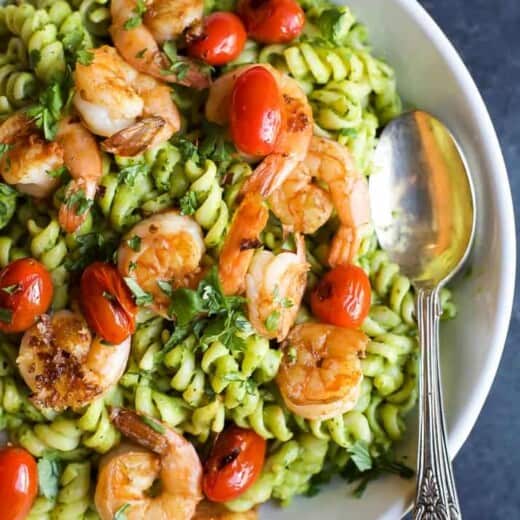 chimichurri avocado pasta with pan seared shrimp and tomatoes