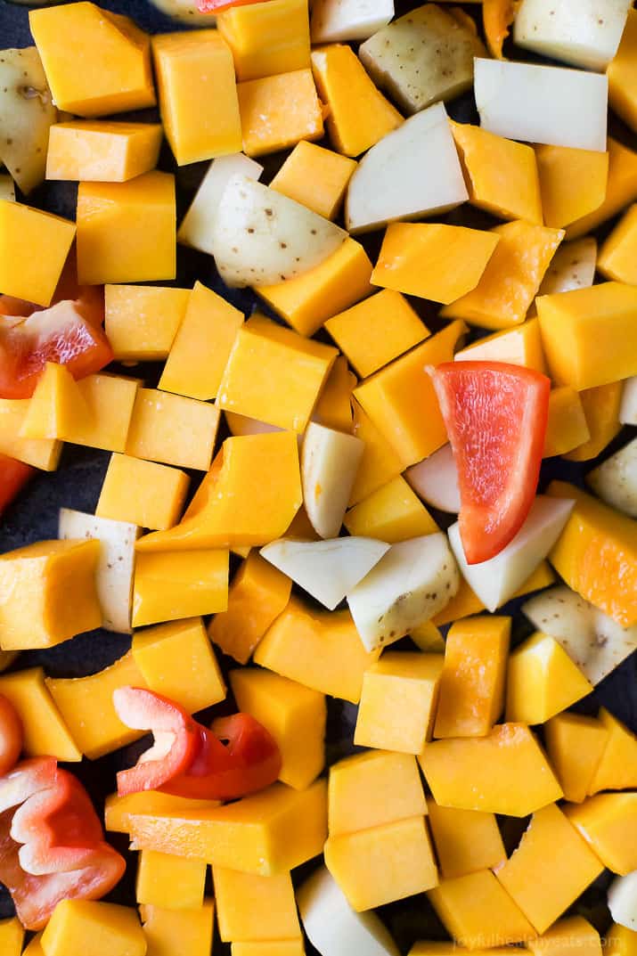 Cubed butternut squash, potatoes, and red bell pepper