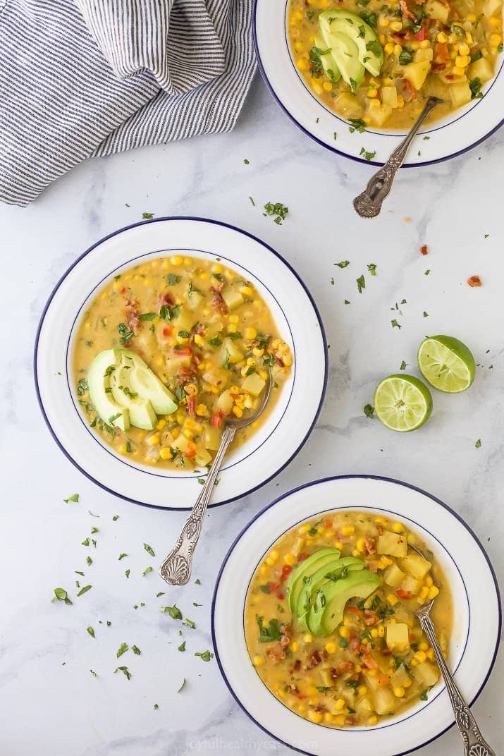 overhead view of crock pot potato corn chowder recipe in bowls