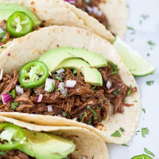 close up of slow cooker barbacoa short rib tacos