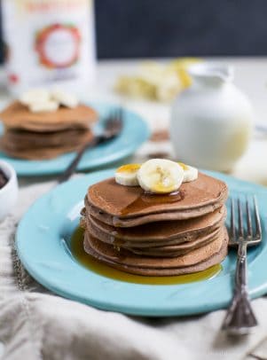 Maximize your breakfast with these Protein Chocolate Pancakes that have a whooping 19 grams of protein per serving. These pancakes are the perfect way to start off the day! | joyfulhealthyeats.com #healthy #ad #breakfast @burtsbees