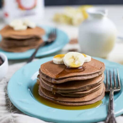 Maximize your breakfast with these Protein Chocolate Pancakes that have a whooping 19 grams of protein per serving. These pancakes are the perfect way to start off the day! | joyfulhealthyeats.com #healthy #ad #breakfast @burtsbees