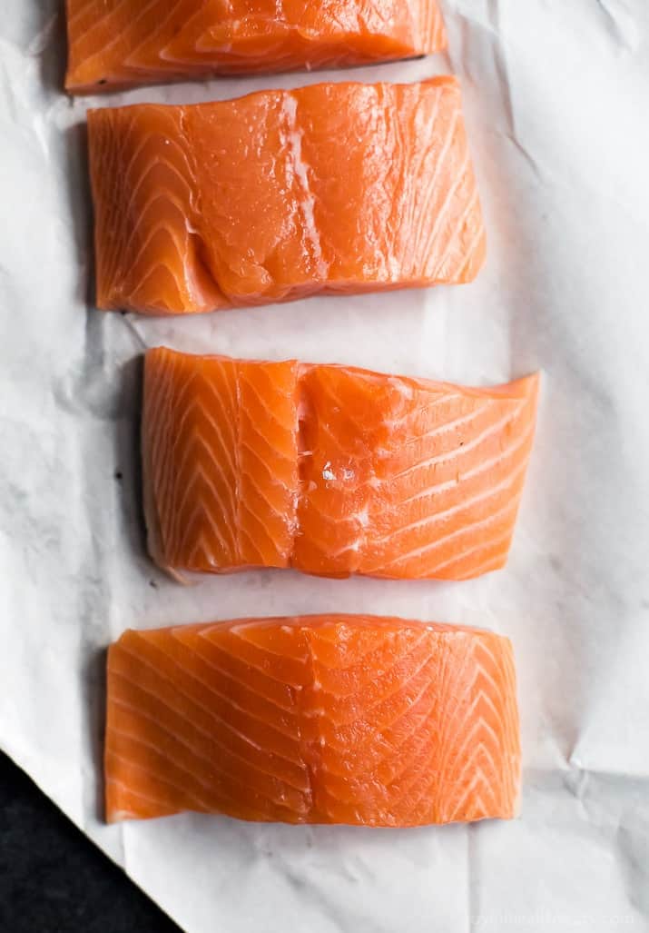 Raw salmon on white paper