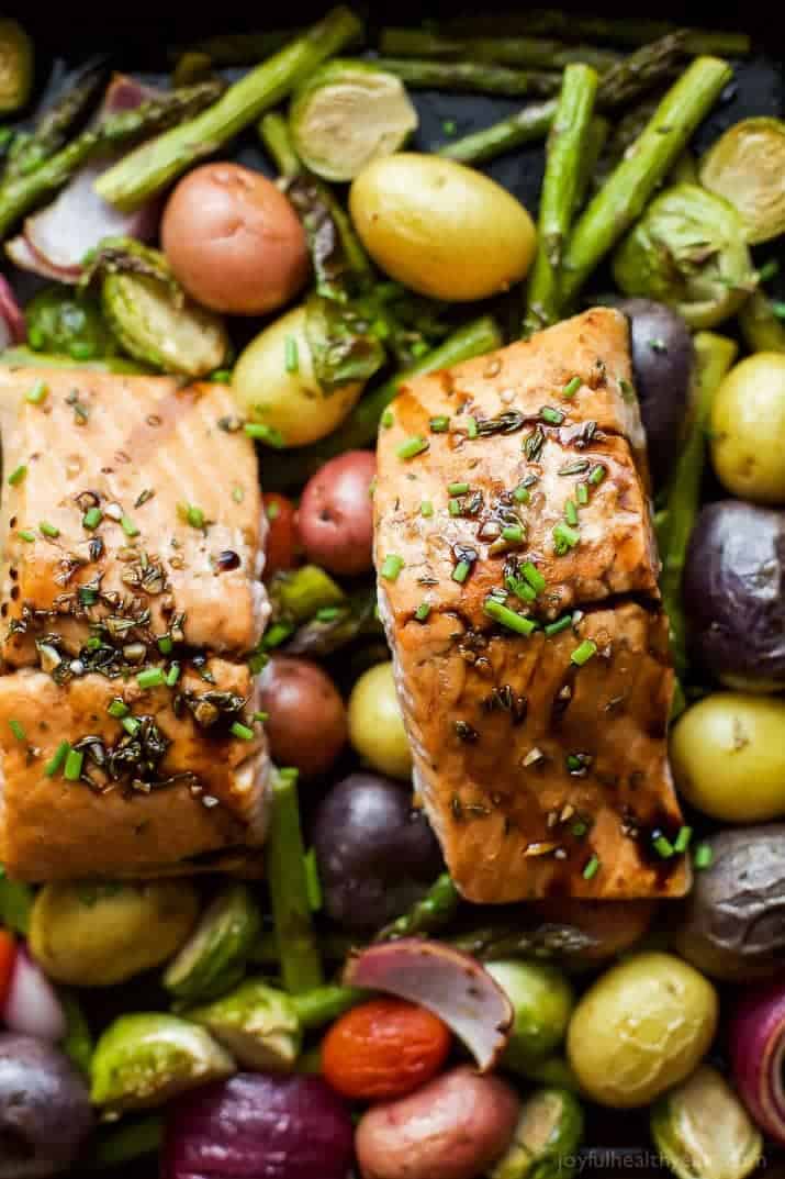 Balsamic Salmon on top of cooked potatoes, asparagus, and brussels sprouts