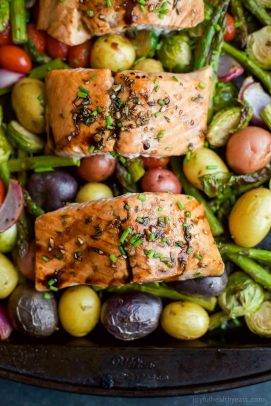 Sheet Pan Balsamic Salmon on a bed of potatoes, asparagus, and brussels sprouts! An easy healthy meal done in 30 minutes and full of bold flavors you'll love! | joyfulhealthyeats.com #paleo #glutenfree