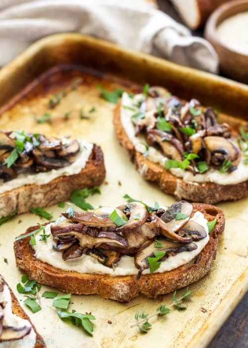 Take your toast to a whole new level with these Lemon Rosemary White Bean Toasts with Mushrooms! Creamy white beans spread on whole grain toast and topped with sautéed mushrooms. They’re perfect for any meal or an afternoon snack!
