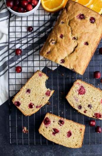 Moist Orange Cranberry Bread, made with fresh cranberries and fresh orange juice. This Cranberry Orange Bread is one of the BEST things you'll have all fall! | joyfulhealthyeats.com