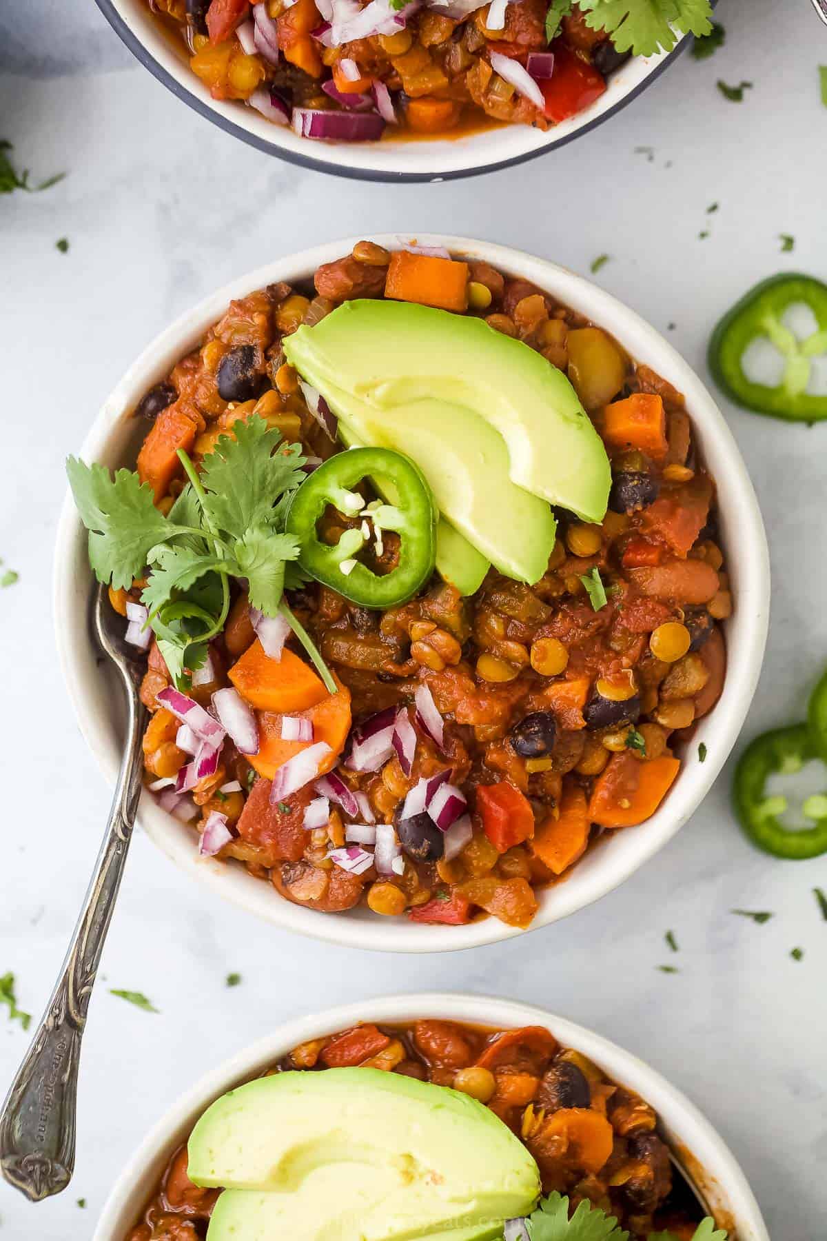 Bowl filled with vegetarian lentil chili.