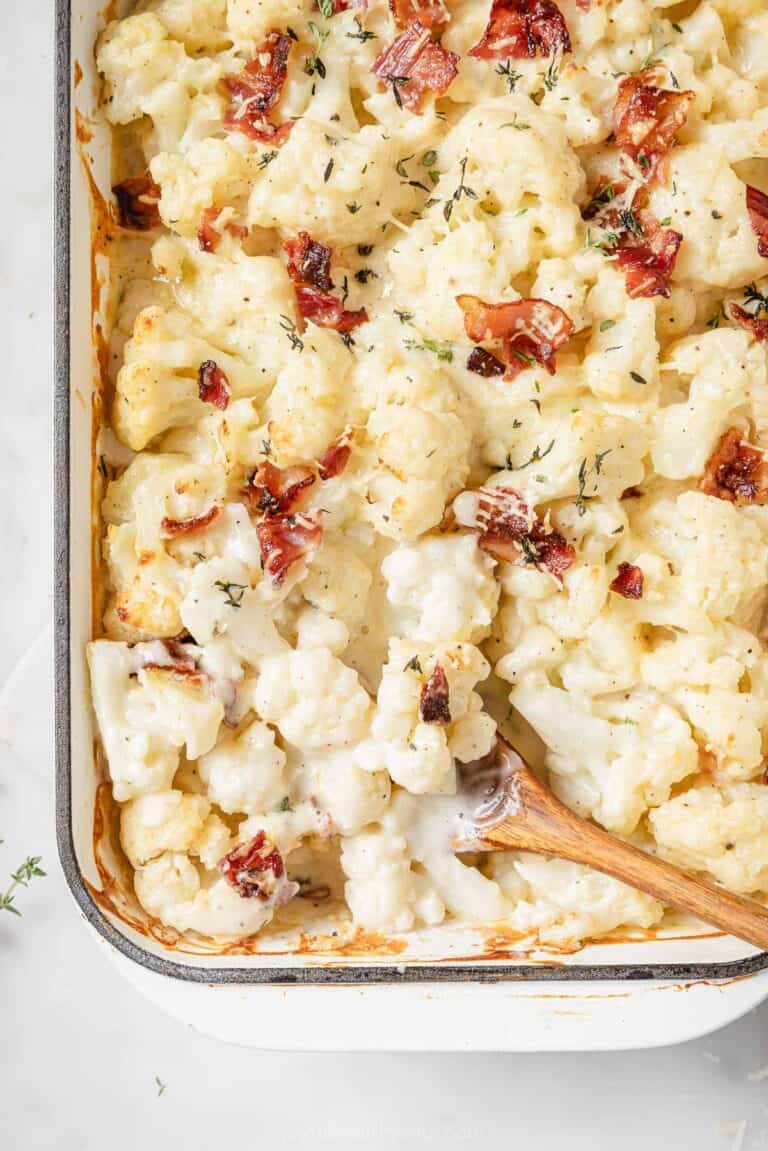 Freshly baked cheesy cauliflower au gratin with bacon.