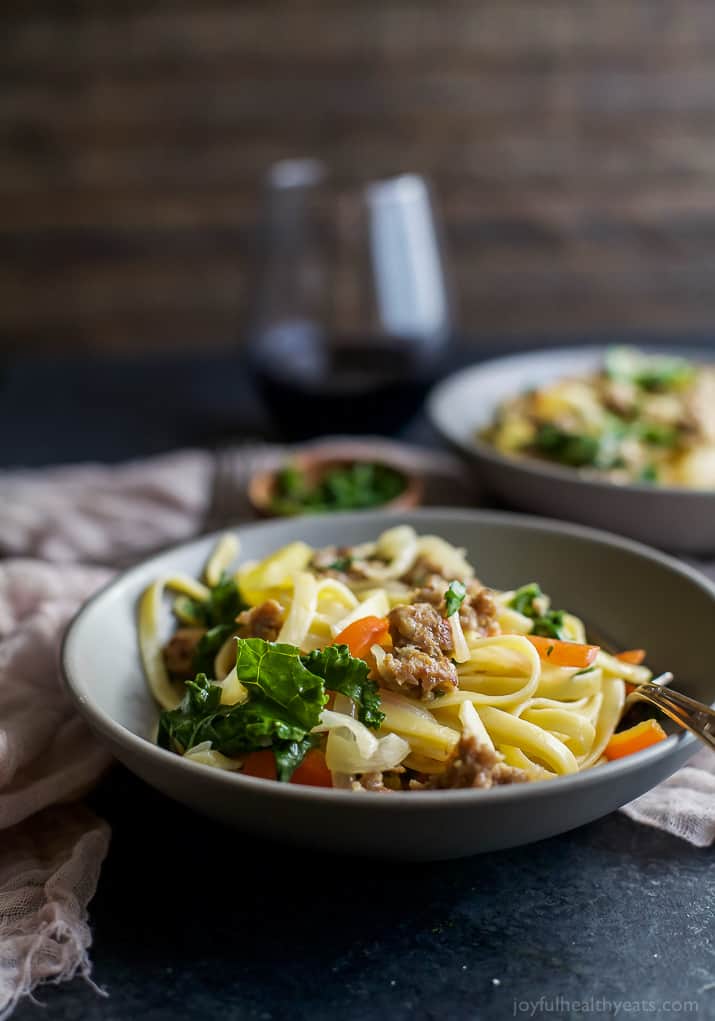 A bowl of Creamy Kale Pepper & Sausage Pasta