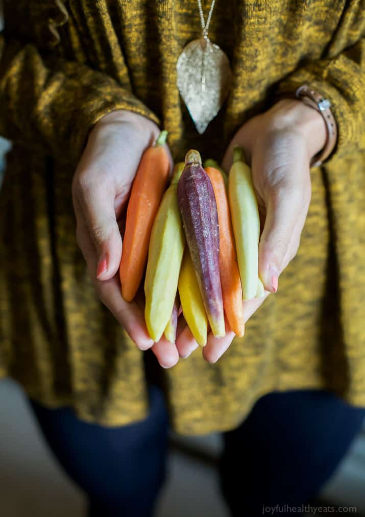 Jazz up your Carrots during the holidays with these RAINBOW MAPLE DIJON GLAZED CARROTS. Sprinkle them with some fresh herbs for an extra pop of flavor! These are a must for your dinner table this Thanksgiving! | joyfulhealthyeats.com #glutenfree