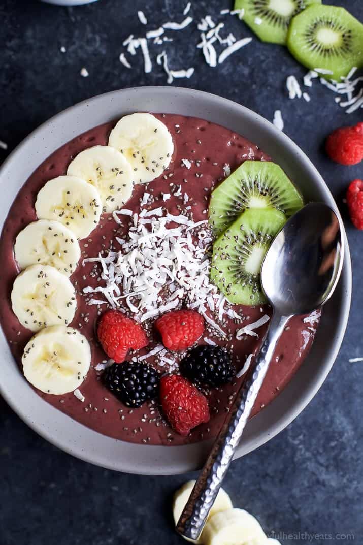 BANANA BERRY SMOOTHIE BOWL with banana slices, kiwi, fresh berries and coconut