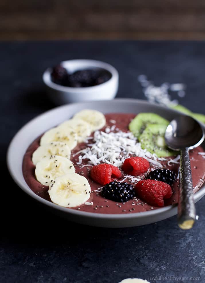 BANANA BERRY SMOOTHIE BOWL with banana slices, kiwi, fresh berries and coconut