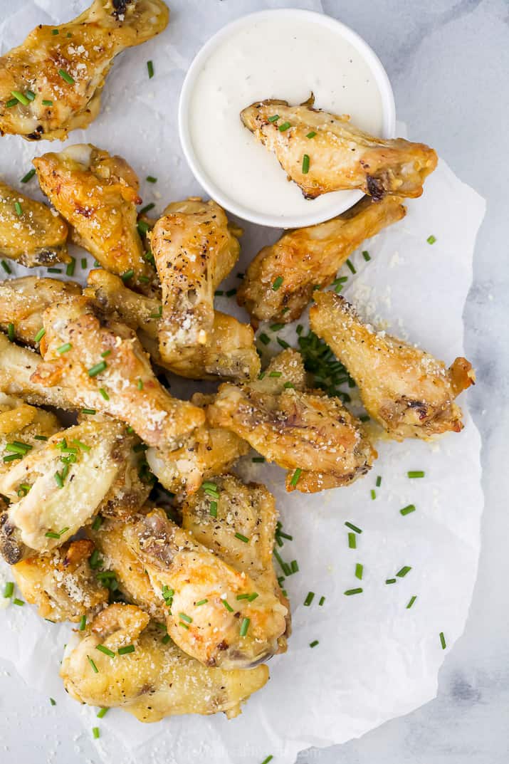 overhead view of crispy baked garlic parmesan chicken wings