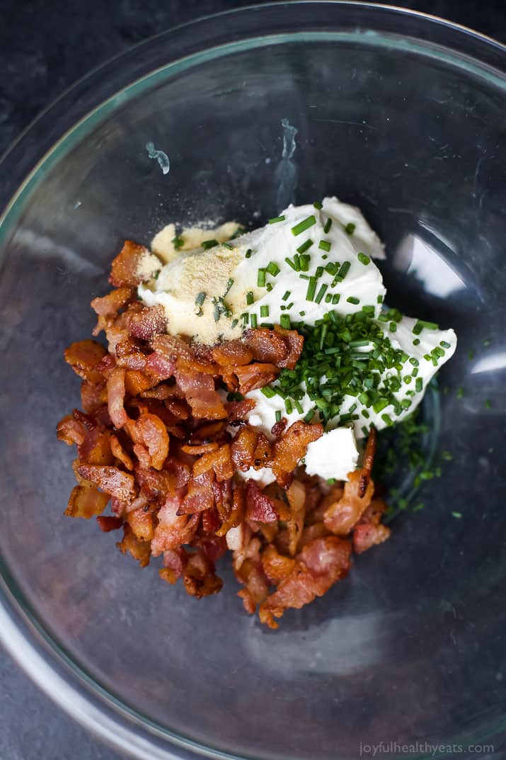 Filling ingredients for Cheesy Bacon Stuffed Peppers in a mixing bowl