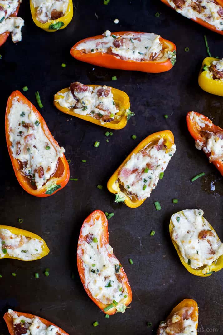 Top view of mini bell pepper halves stuffed with cheesy bacon filling