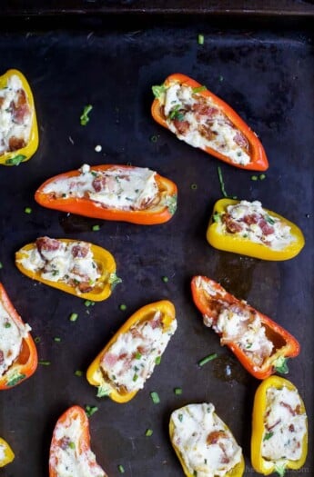 CHEESY BACON STUFFED PEPPERS, everything about this delicious appetizer is addicting! Perfect for the holidays! Top these little pepper bites with a dab of pepper jelly and I guarantee you'll be in a heaven! | joyfulhealthyeats.com #glutenfree