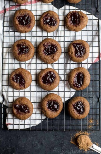 Thumbprint Cookies are a classic Christmas Cookie around the holidays. These RASPBERRY CHOCOLATE THUMBPRINT COOKIES have a subtle chocolate flavor with a burst of raspberry that you'll fall in love with! | joyfulhealthyeats.com