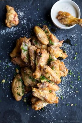 CRISPY GARLIC PARMESAN CHICKEN WINGS - baked instead of fried but these classic chicken wings are still as crispy and delicious as ever! The perfect party appetizer or game day treat! | joyfulhealthyeats.com | Gluten Free Recipes