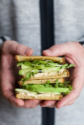 stacked cucumber avocado sandwich with herb goat cheese