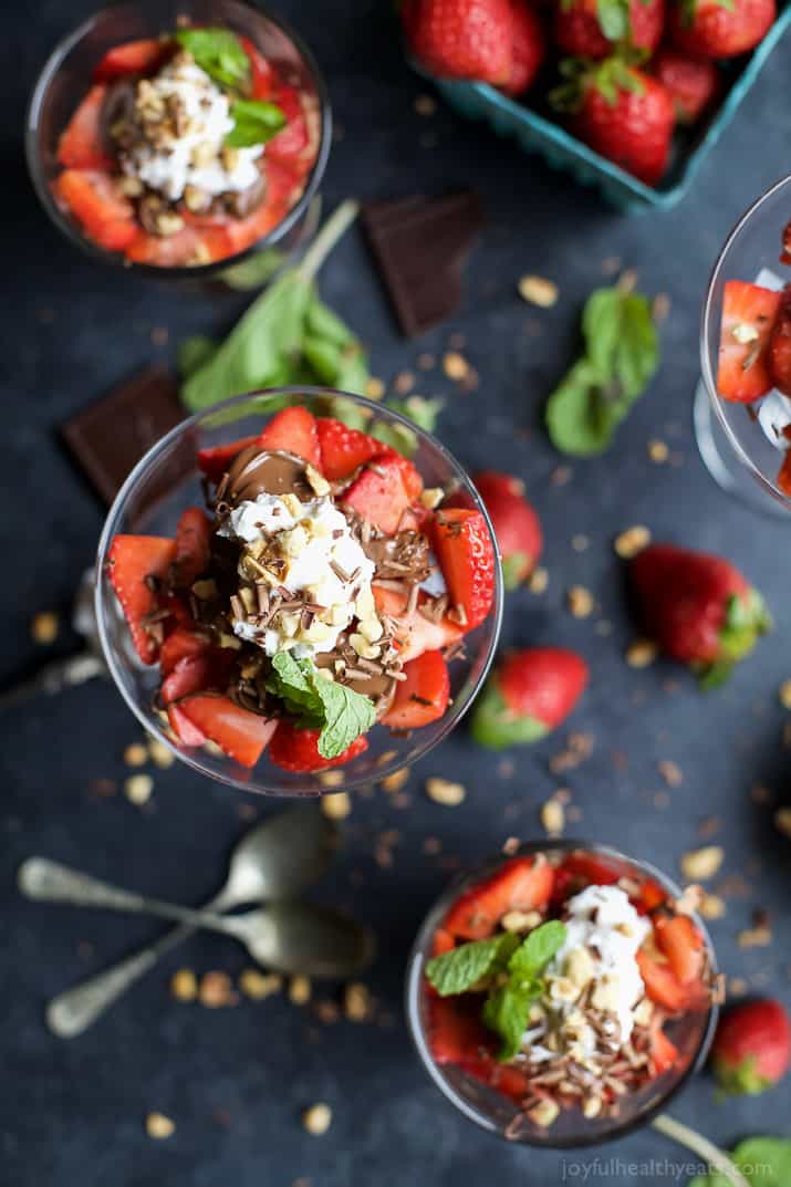 NUTELLA STRAWBERRY PARFAIT WITH COCONUT WHIPPED CREAM - an easy healthy dessert filled with fresh strawberries, drizzled with Nutella and Whipped Cream. The perfect Valentines Day dessert! | joyfulhealthyeats.com