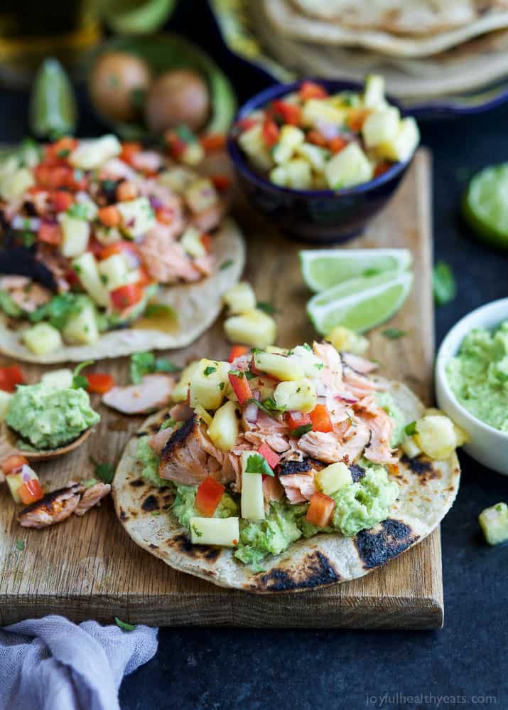 PINEAPPLE CHIPOTLE SALMON TOSTADAS - slightly charred smoky Salmon combined with Spicy Pineapple Salsa and creamy Avocados. These Tostadas take 30 minutes to make and are only 283 calories, a must make for a busy weeknight! | joyfulhealthyeats.com | gluten free recipes