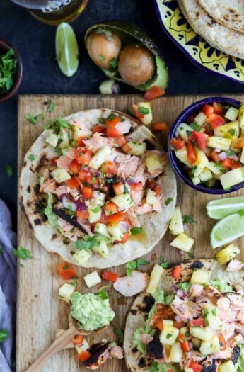 PINEAPPLE CHIPOTLE SALMON TOSTADAS - slightly charred smoky Salmon combined with Spicy Pineapple Salsa and creamy Avocados. These Tostadas take 30 minutes to make and are only 283 calories, a must make for a busy weeknight! | joyfulhealthyeats.com | gluten free recipes