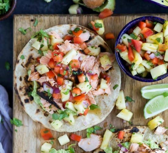 PINEAPPLE CHIPOTLE SALMON TOSTADAS - slightly charred smoky Salmon combined with Spicy Pineapple Salsa and creamy Avocados. These Tostadas take 30 minutes to make and are only 283 calories, a must make for a busy weeknight! | joyfulhealthyeats.com | gluten free recipes