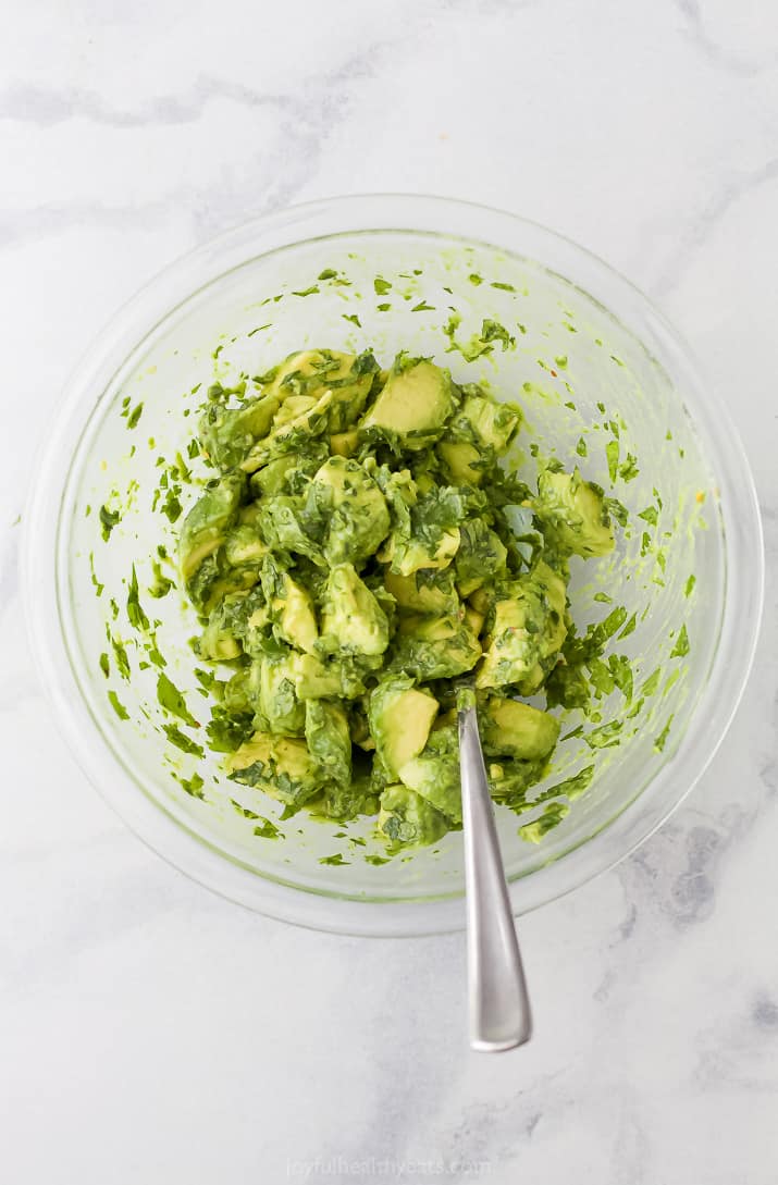 Homemade avocado salsa in a bowl.