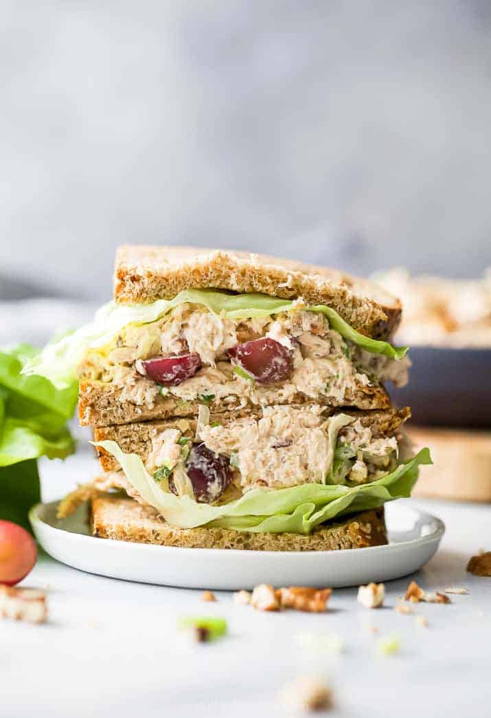 Chicken salad sandwich on a white plate