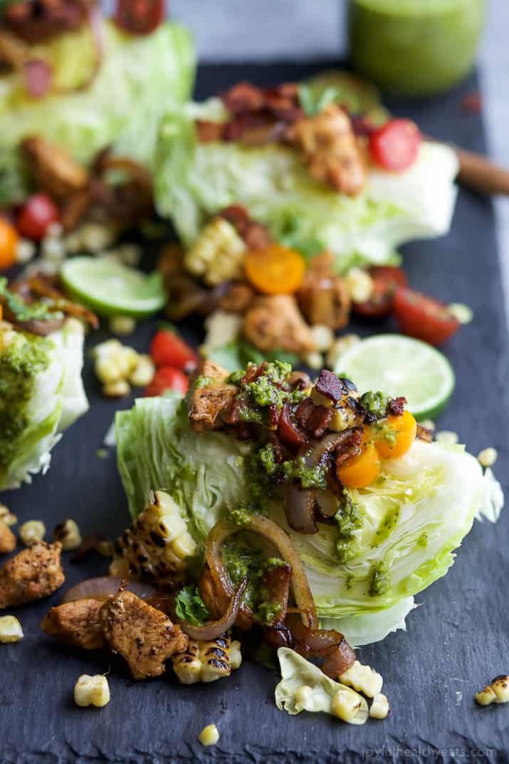 SOUTHWESTERN WEDGE SALAD with seasoned chicken, bacon, onion rings, charred corn a POBLANO DRESSING you'll adore. The wedge salad only takes 30 minutes to make & is under 400 calories a serving! | joyfulhealthyeats.com | Gluten Free Recipes