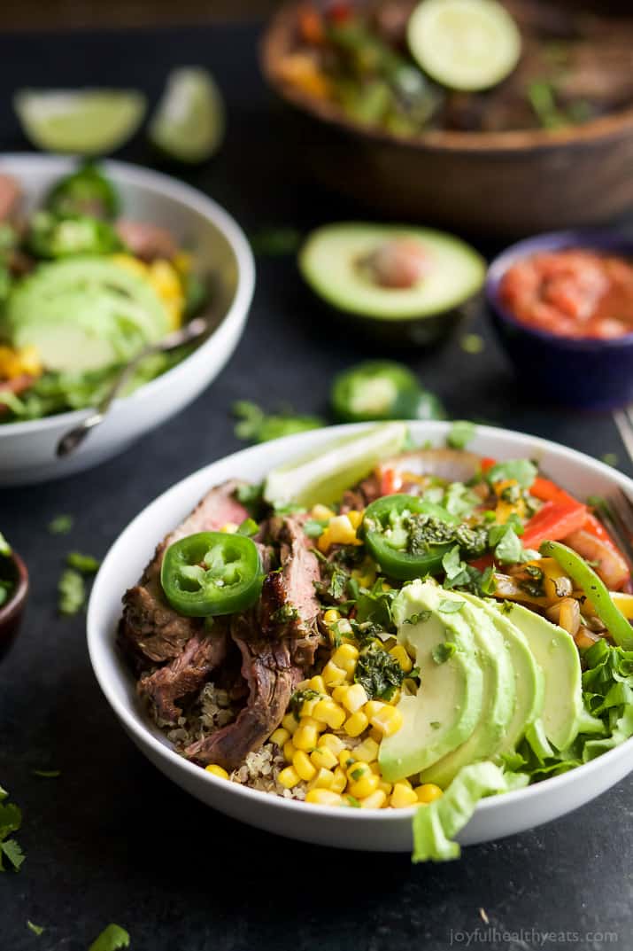 Steak Fajita Burrito Bowls with avocado, corn, and other fresh veggies