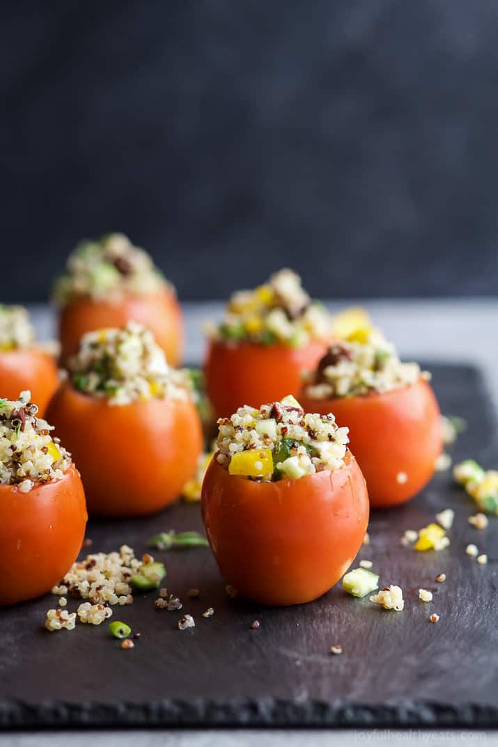 MEDITERRANEAN QUINOA STUFFED TOMATOES - an easy, light, and refreshing vegetarian recipe that's only 142 calories! The perfect side dish for your next summer party! | joyfulhealthyeats.com | gluten free recipes