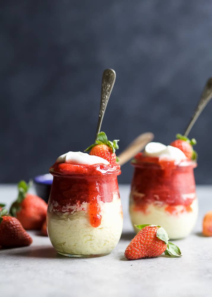 SKINNY CHEESECAKE for two made with greek yogurt and topped with fresh strawberries slightly sweetened with honey. The perfect healthy sweet dessert for those late night cravings! | joyfulhealthyeats.com