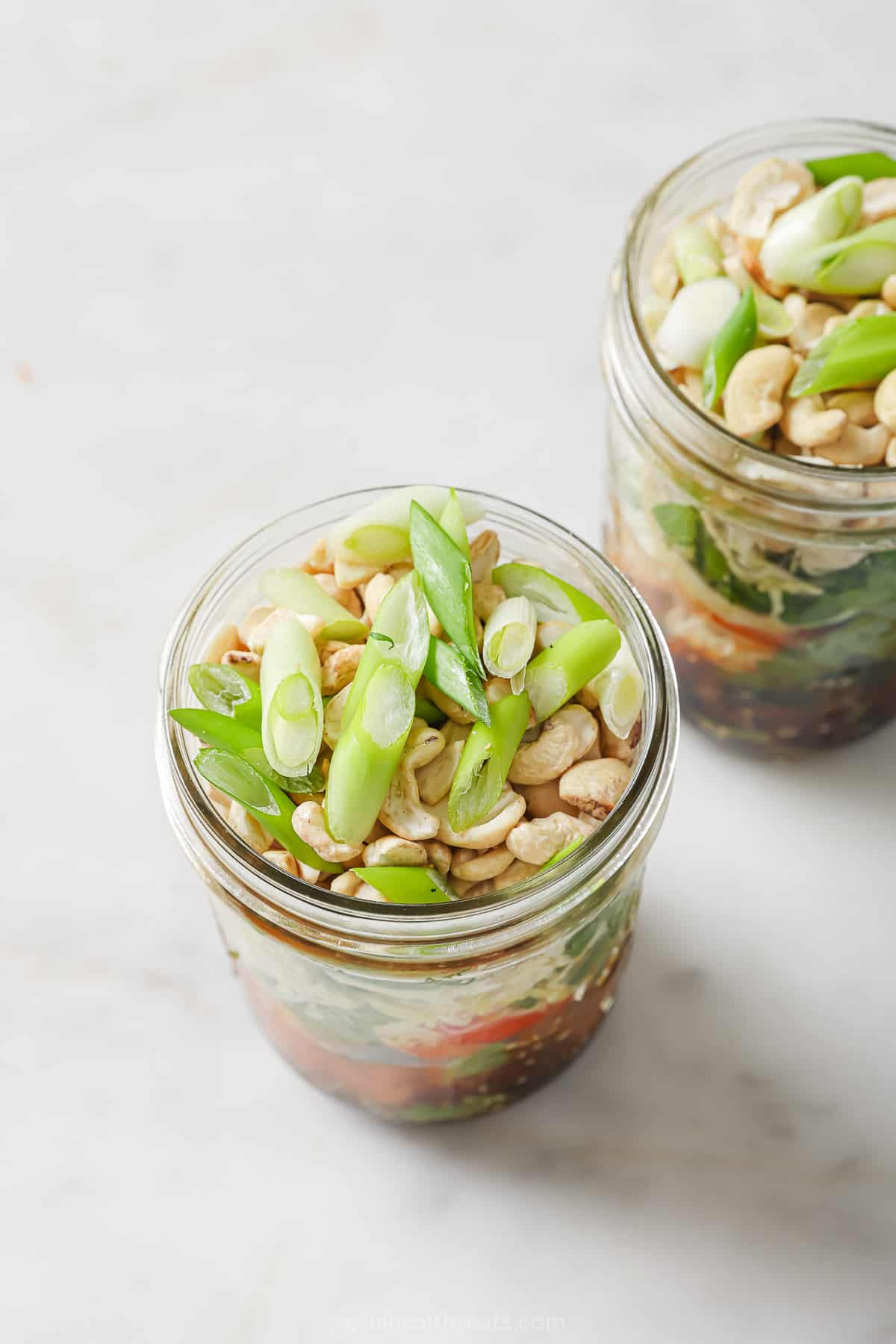 Angled photo of mason jar salads.