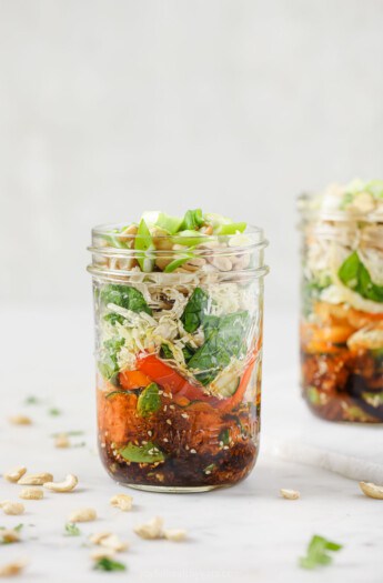 Mason jar salads with chicken and homemade dressing.