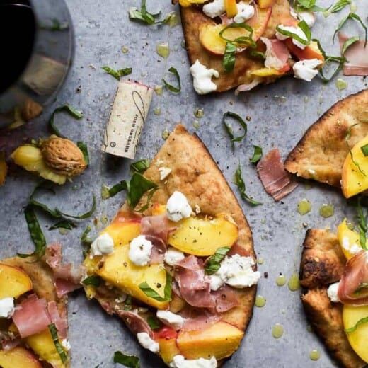 Image of Slices of Grilled Prosciutto Peach Flatbread Pizza