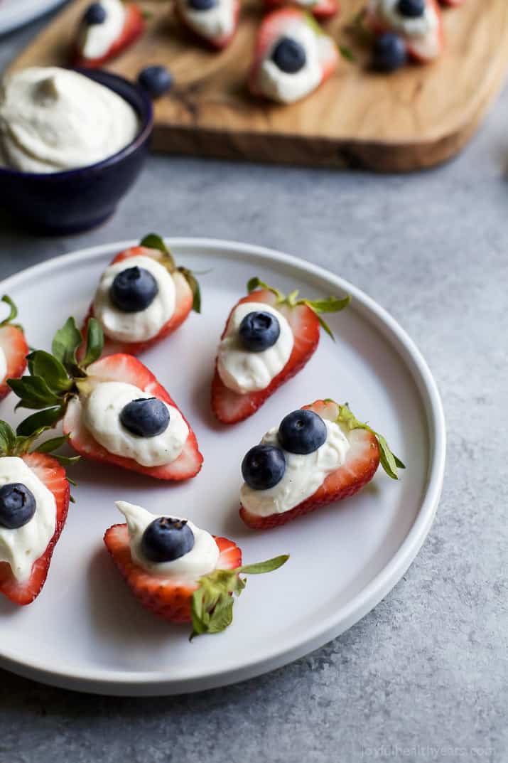 Patriotic Cheesecake Stuffed Strawberries - an easy healthy recipe that tastes like strawberry cheesecake but without all the calories!