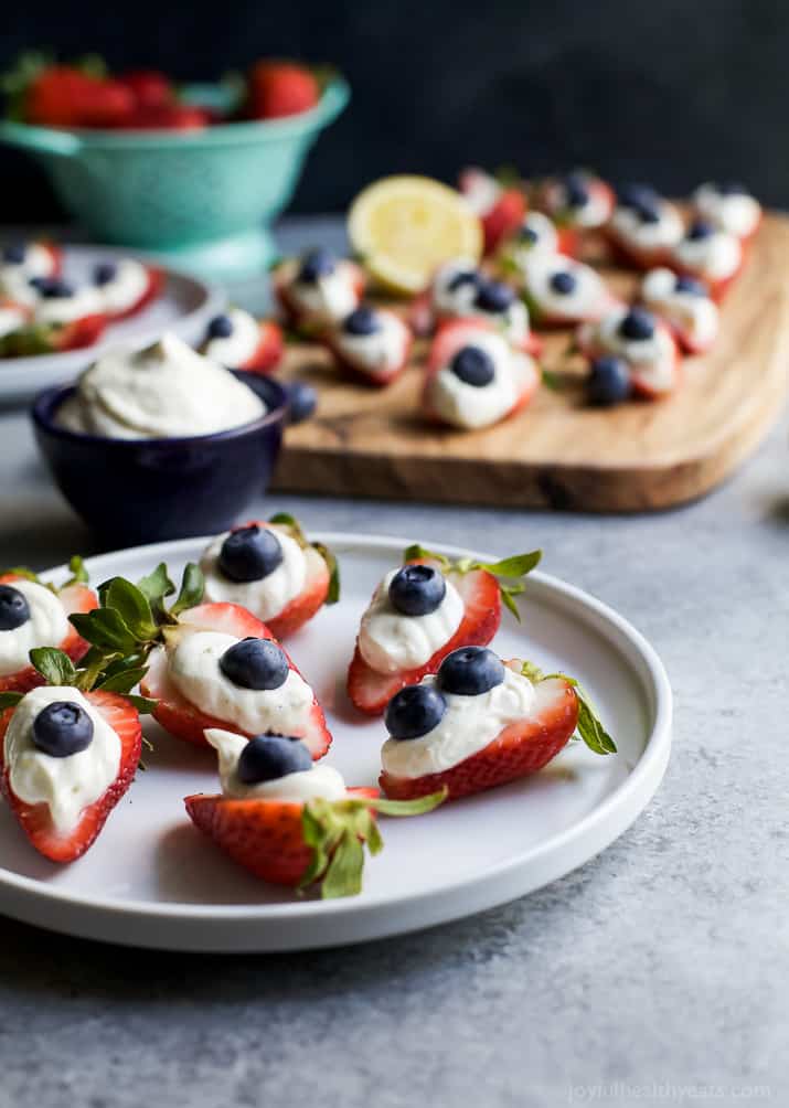 Patriotic Cheesecake Stuffed Strawberries - an easy healthy recipe that tastes like strawberry cheesecake but without all the calories!