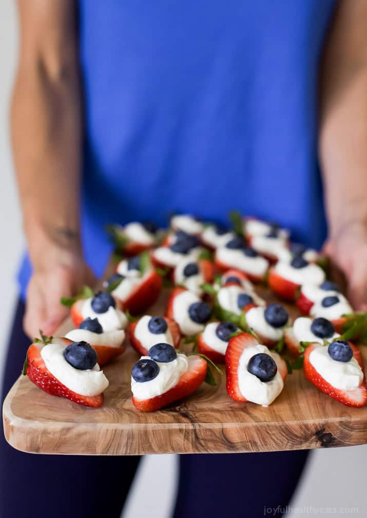 Patriotic Cheesecake Stuffed Strawberries - an easy healthy recipe that tastes like strawberry cheesecake but without all the calories!