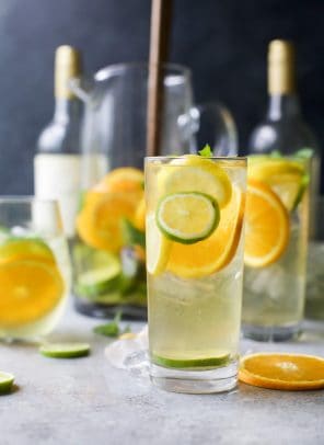 Easy Citrus White Wine Sangria with loads of citrus, white wine and citrus vodka. It's the perfect refreshing cocktail to sip on those hot summer days!