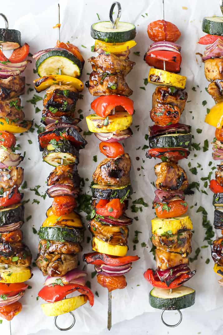 overhead photo balsamic grilled chicken kabobs garnished with parsley