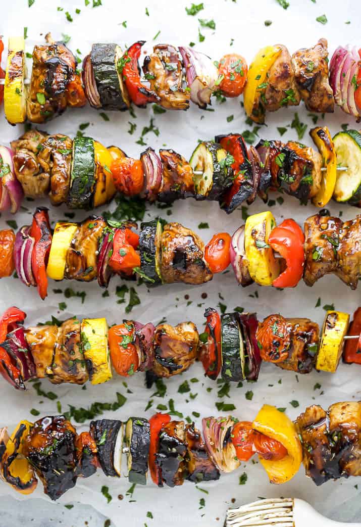 overhead photo of best ever balsamic grilled chicken kabobs garnished with parsley