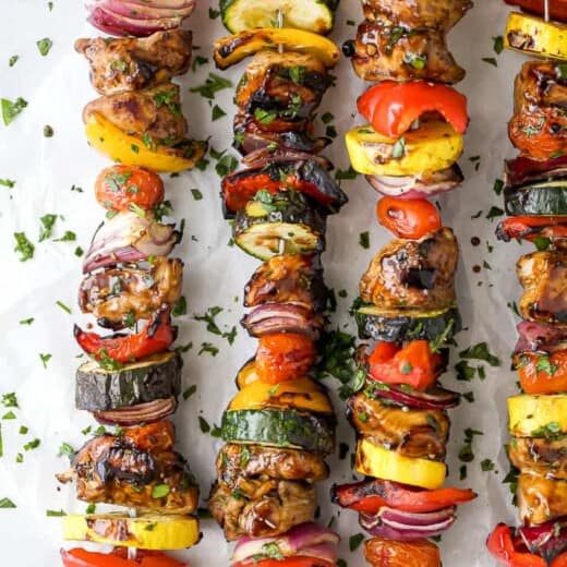 overhead photo of the best ever balsamic grilled chicken kabobs lying on a table