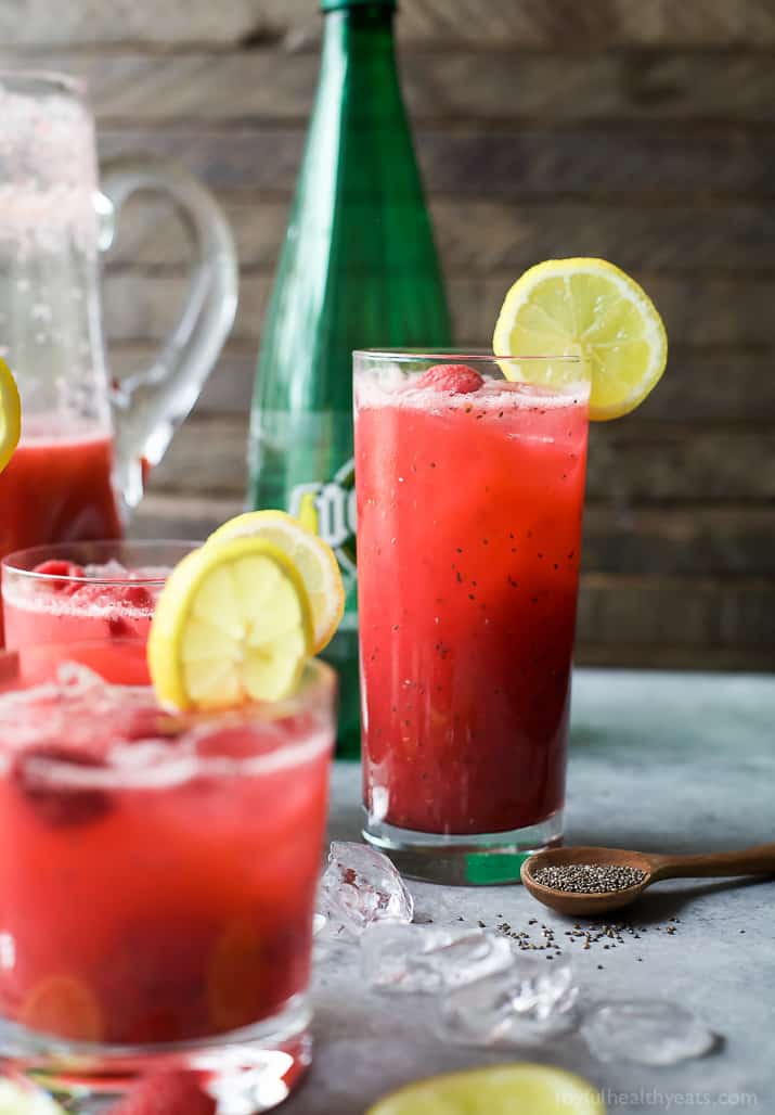 Glasses of Chia Raspberry Lemonade Spritzer with lemon slice garnish