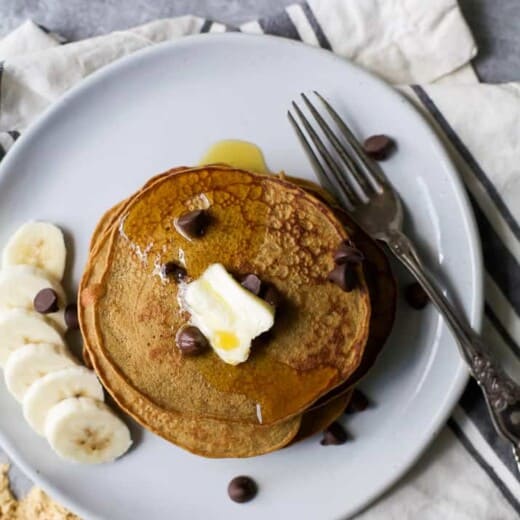 Image of Flourless Peanut Chocolate Chip Pancakes with Banana Slices