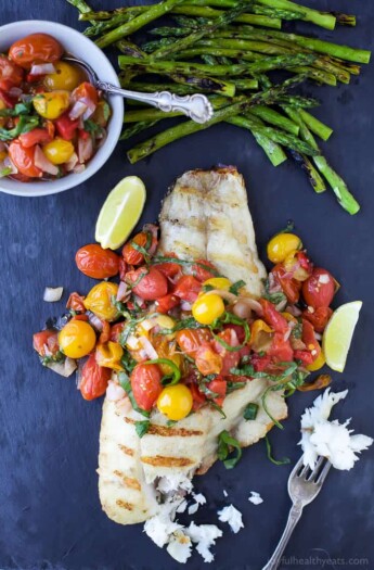 Grilled Red Snapper topped with a Roasted Red Pepper and Charred Tomato Relish for a light and fresh 30 Minute meal perfect for summer! | paleo recipes | gluten free