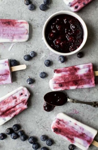 Your summer just got tastier with this creamy dreamy Paleo Blueberry Coconut Popsicles. Made from all fresh ingredients, no dairy, no refined sugar and 100% yum!
