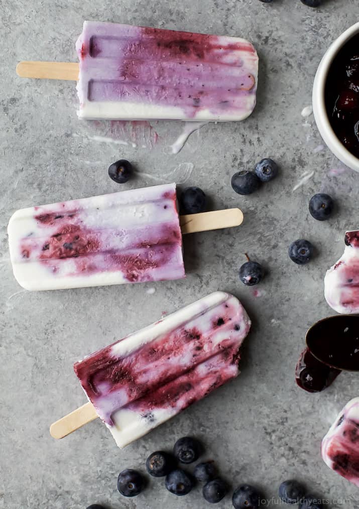 Your summer just got tastier with this creamy dreamy Paleo Blueberry Coconut Popsicles. Made from all fresh ingredients, no dairy, no refined sugar and 100% yum!