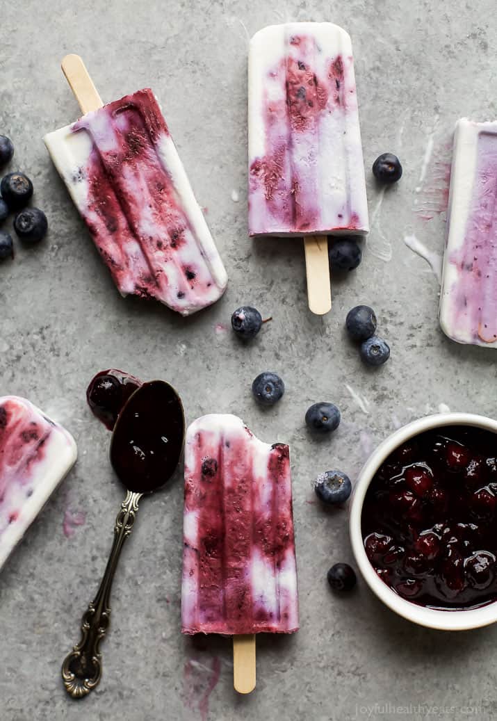 Your summer just got tastier with this creamy dreamy Paleo Blueberry Coconut Popsicles. Made from all fresh ingredients, no dairy, no refined sugar and 100% yum!